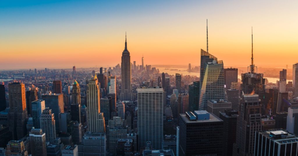 New York City Skyline with Urban Skyscrapers at Sunset, USA