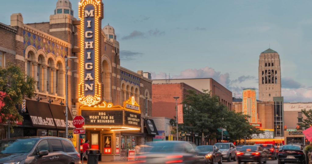 Ann Arbor, Michigan, USA 2020 - Michigan Theater on State Street downtown during sunset with cars