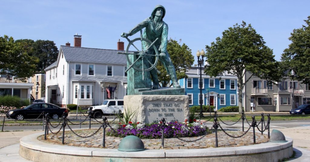 Gloucester, MA, USA - July 27, 2020: Fisherman's Memorial Cenotaph, also known as "Man at the Wheel" statue, on South Stacy Boulevard
