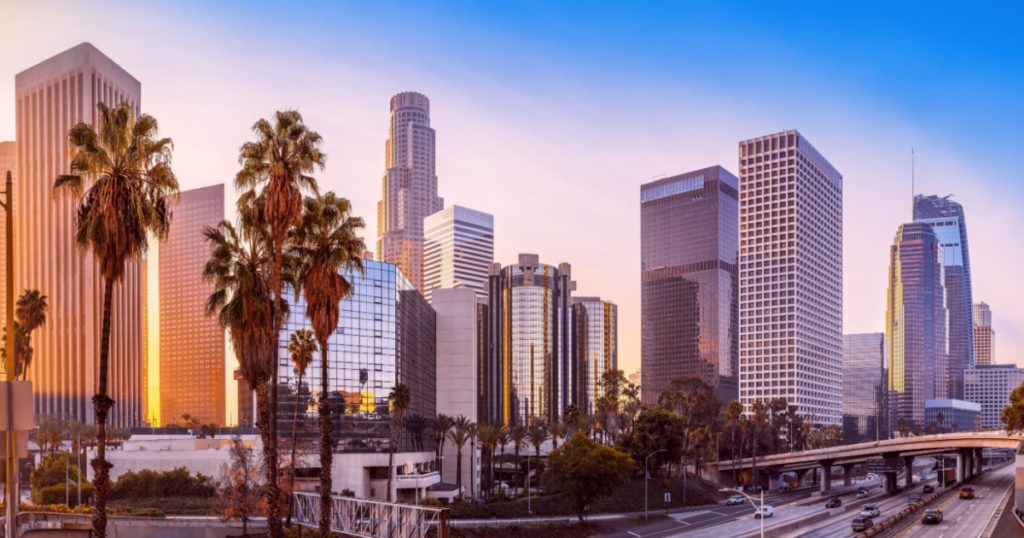 the skyline of los angeles during sunrise