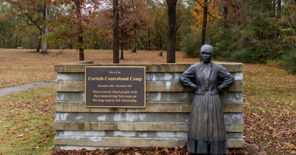 Corinth, Mississippi -2023: Corinth Contraband Camp, Shiloh National Military Park. Many African-Americans who fled Southern plantations sought freedom at Union occupied sites. Greeter statue and sign