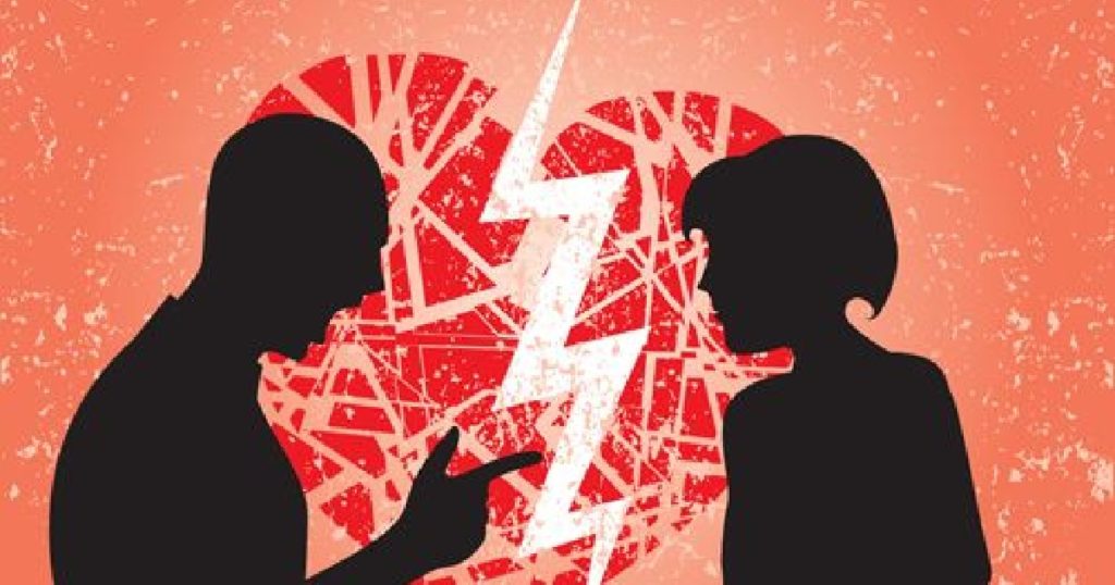 Man and woman having break up. Image showing broken heart on a grunge background.