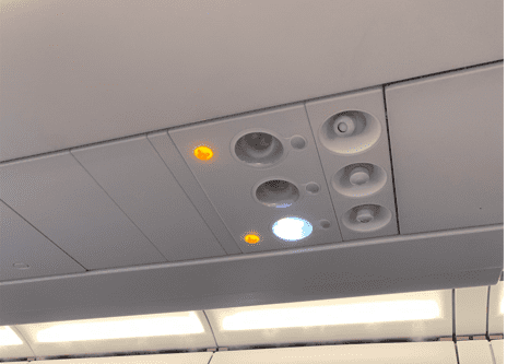 Air vents on an airplane. 