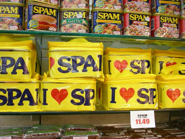 Spam merchandise on a shelf under a shelf of Spam