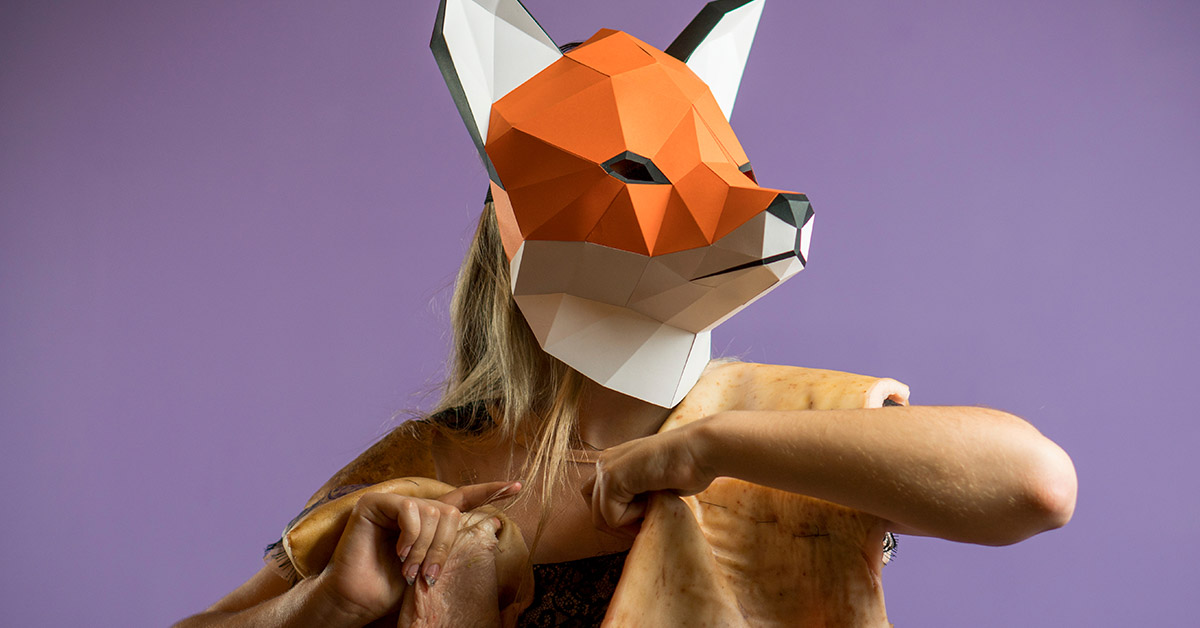 woman wearing fox mask