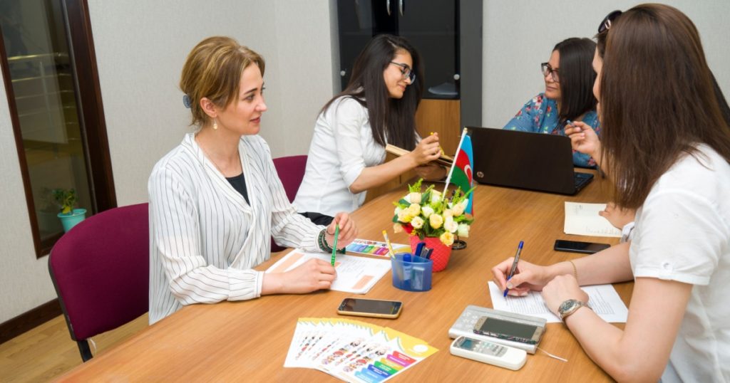 Baku, Azerbaijan, may 10, 2018: several young business ladies work in the office.