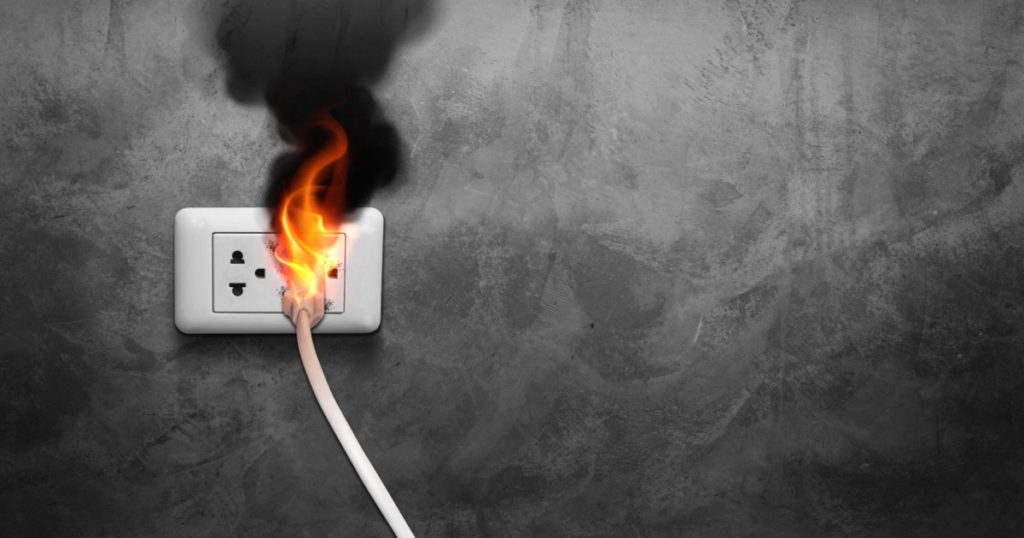 Fire Smoke. Electric wire. Plug socket. Short circuit. Electric plug. Damaged plug. Power socket. Indoor fire. Electrical danger. Electric hazard. Safety hazard. Fire risk. Electric wiring. Emergency