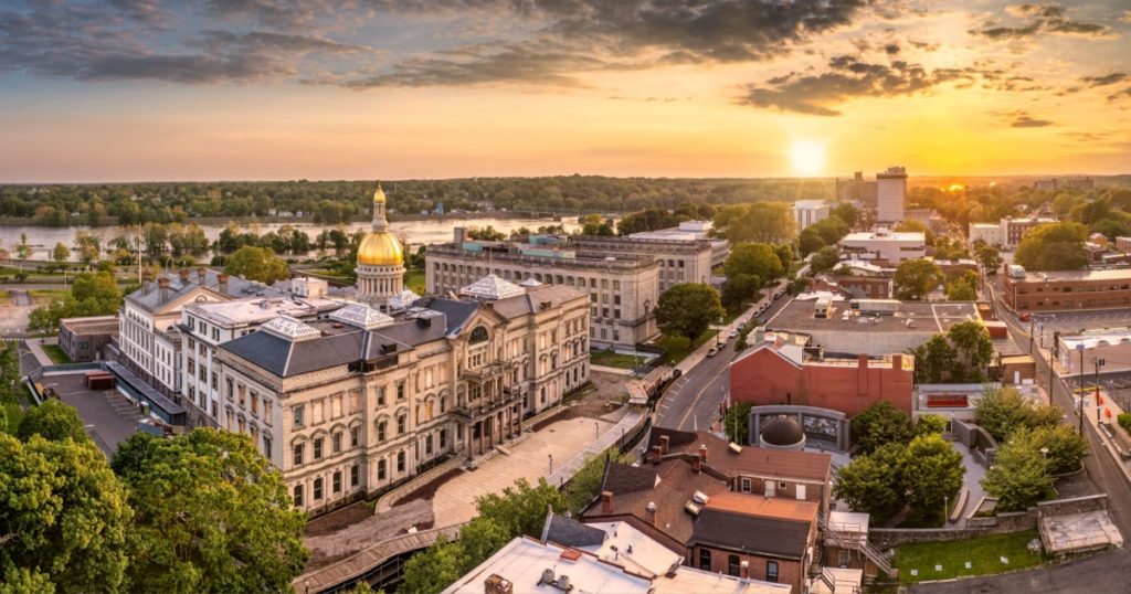 Aerial panorama of Trenton New Jersey skyline amd state capitol at sunset. Trenton is the capital city of the U.S. state of New Jersey and the county seat of Mercer County.