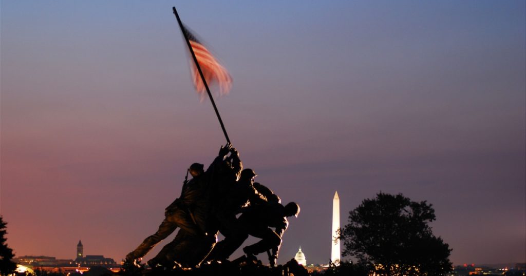 Arlington, VA, USA August 6 The sun rises on the Marine Corp Memorial in Arlington, Virginia within sight of the monuments of Washington, DC