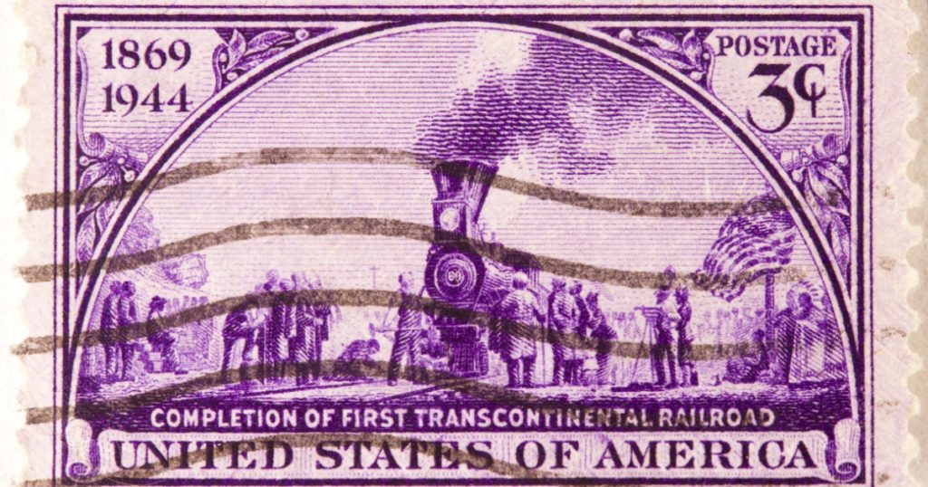 UNITED STATES - CIRCA 1944: A stamp printed in United States. Displays the completion of the First Transcontinental Railroad. United States - circa 1944
