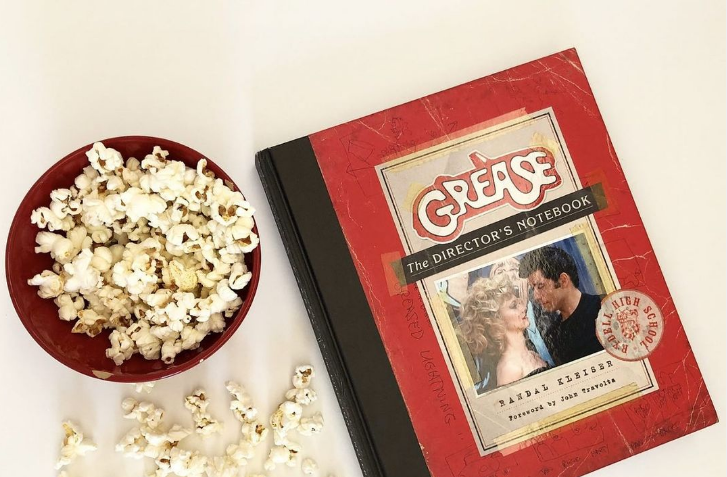 Grease notebook and popcorn