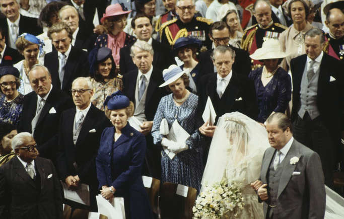Then-Prime Minister of UK, Margaret Thatcher, watching Princess Diana walking down the aisle.
