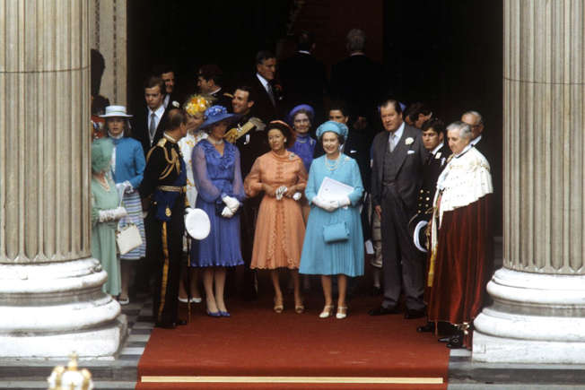The Queen is the first to depart the ceremony among the guests.