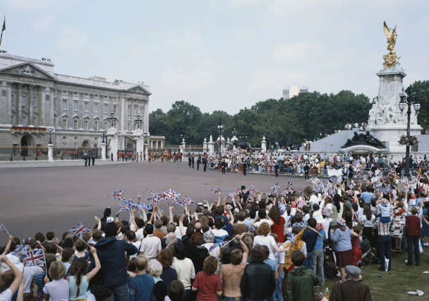 The crowd awaiting the couple's arrival outside Buckingham Palace