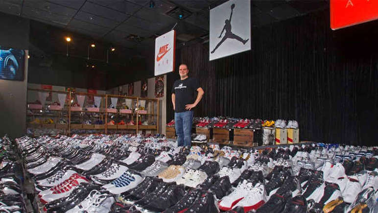 Jordan Michael Geller, in his museum of sneakers.