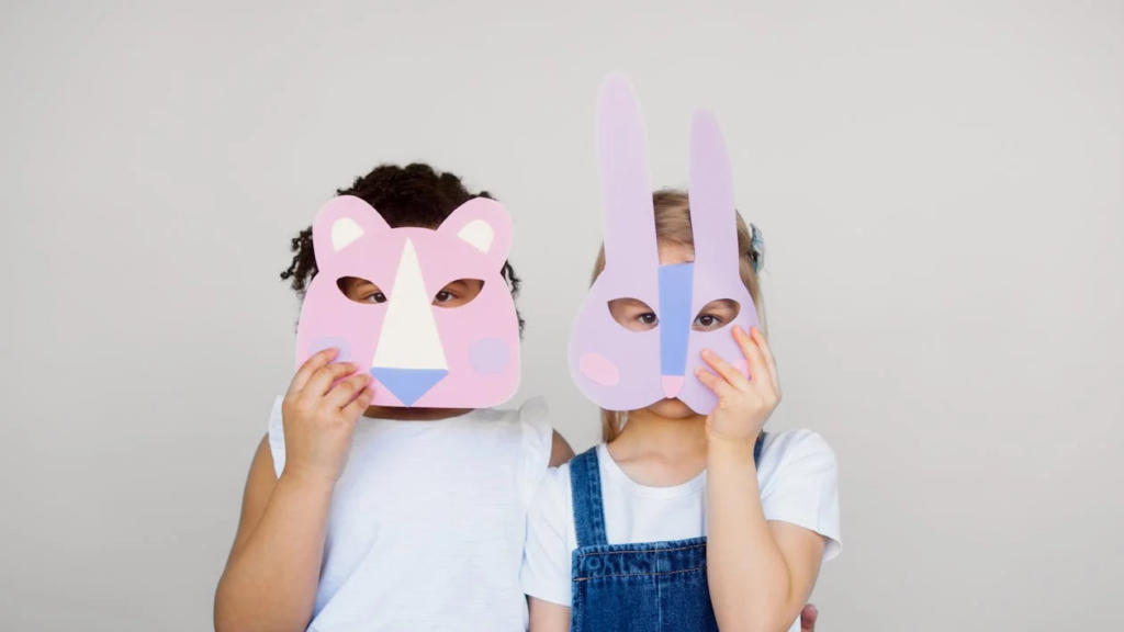 Children wearing animal masks