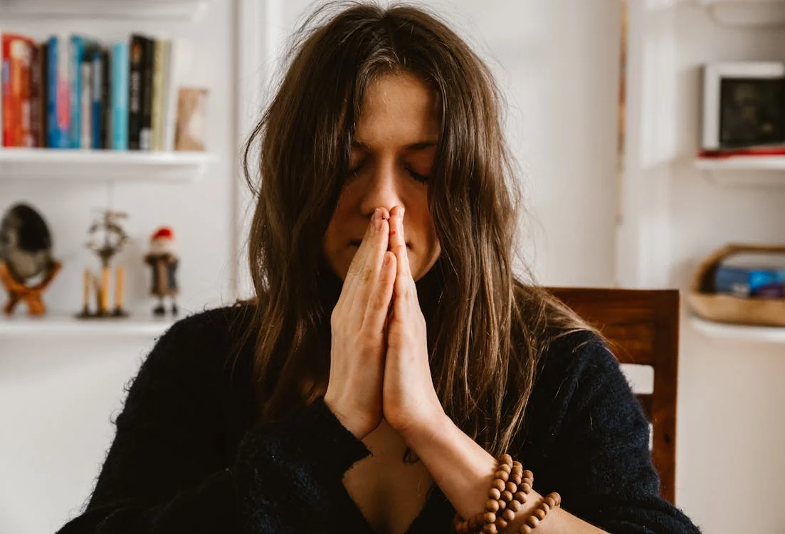Woman reflecting contemplatively, considering trust and promises