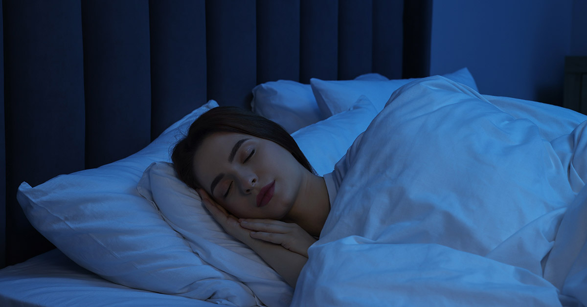 woman sleeping in bed