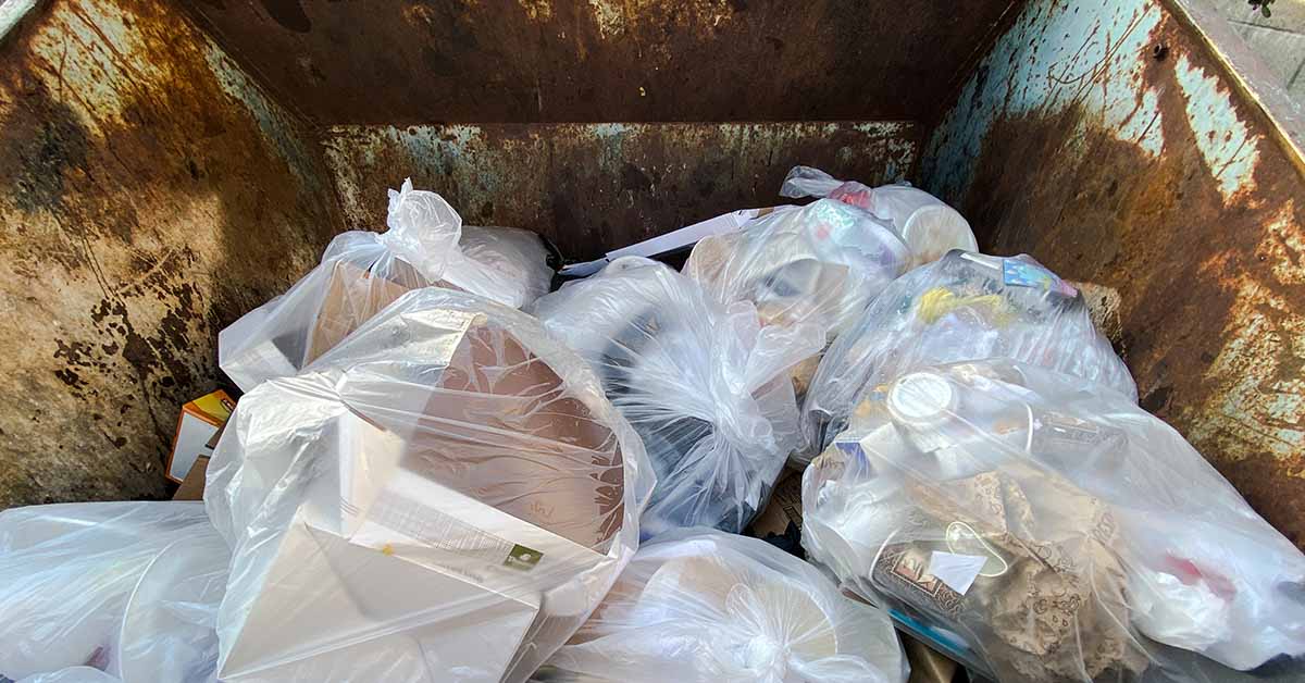 dumpster filled with trash