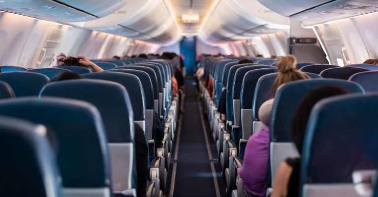 Woman Refused to Switch Plane Seats With Family Who Wanted to Sit Together - Featured image