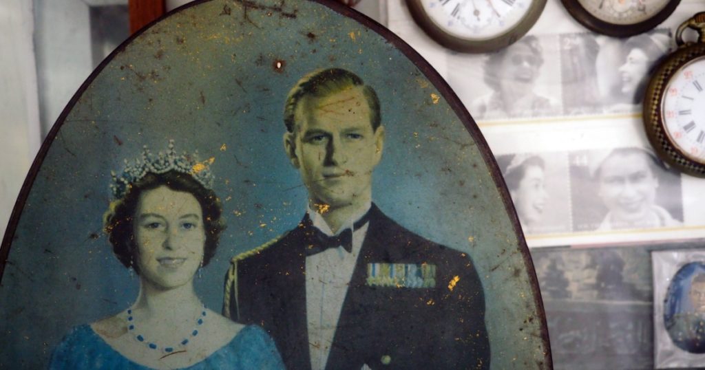 AYUTTHAYA, THAILAND -FEBRUARY 16, 2018: Vintage portrait depicting young Queen Elizabeth II and Prince Philip on a vintage tray