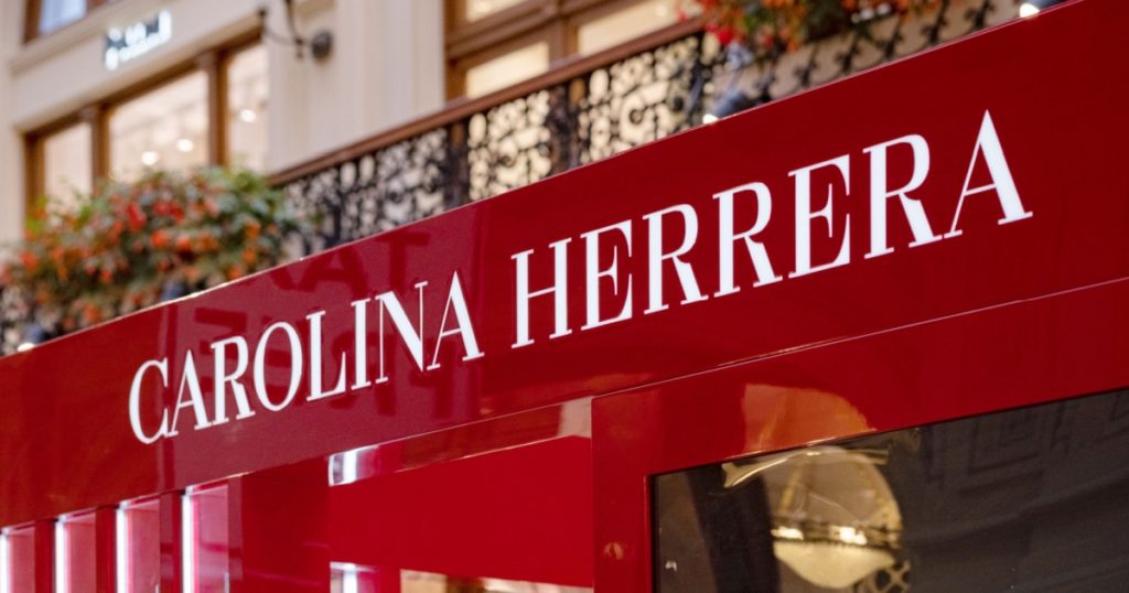 Moscow, Russia - August 2019: Carolina Herrera Boutique In Mall. Logo Carolina Herrera Perfumed Shop Close-Up.