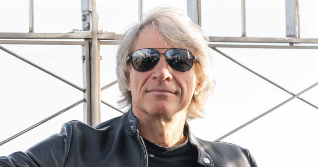 Jon Bon Jovi visits the Empire State Building in New York on September 15, 2023 to light it in blue in partnership with iHeartRadio to announce a new Pfizer vaccine to fight COVID-19