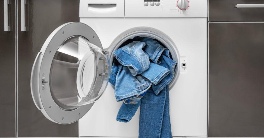 Washing denim items in the washing machine. Delicate cleaning.