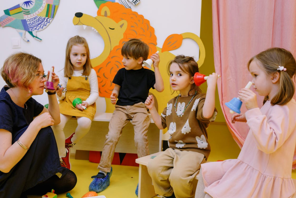 Teacher in classroom with children