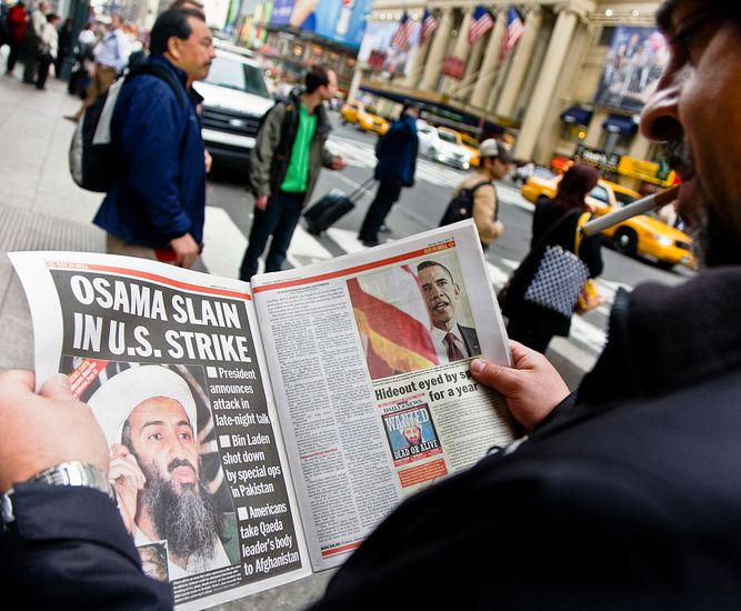 Newspaper with Bin Laden's assassination news.