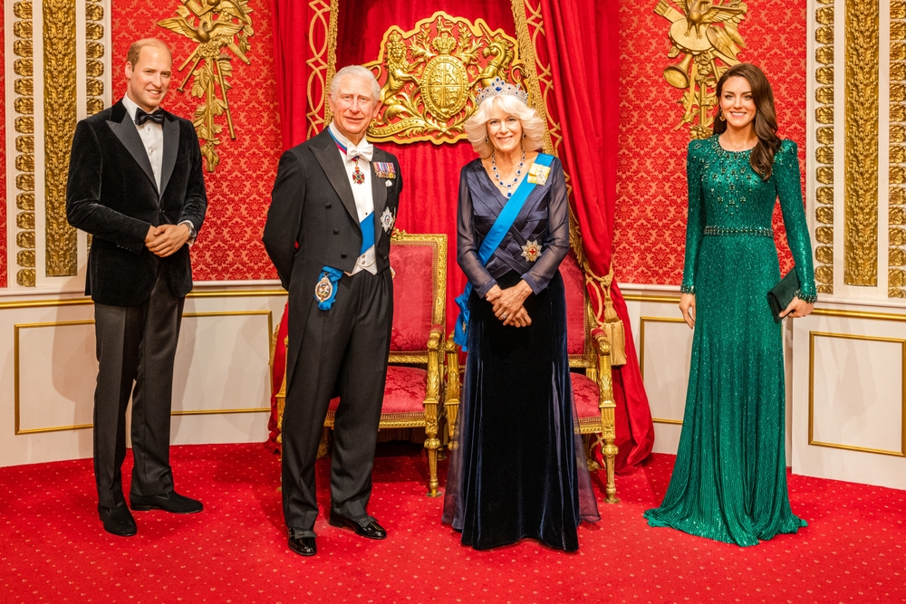 London, England, UK - June 1, 2023: British royal family wax figures inside Madame Tussauds museum; King Charles III, Queen Camila, Prince William,