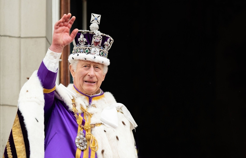 King Charles III on the balcony of Buckingham Palace following the Coronation at Westminster Abbey on May 6, 2023 in London, England.