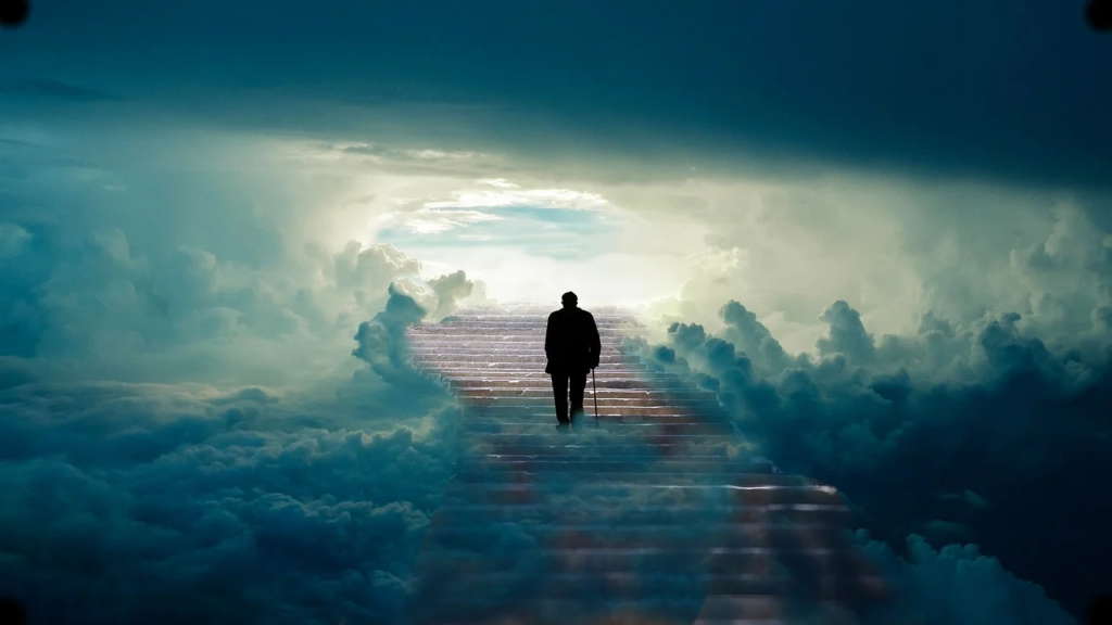 Man walking up cloudy stairs