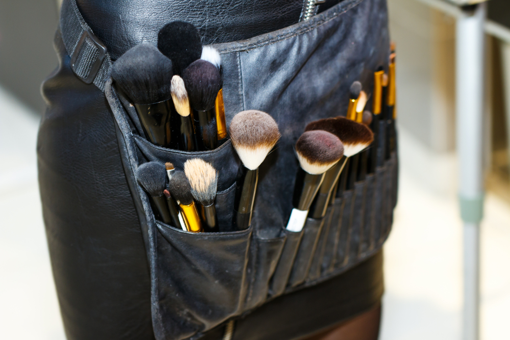 apron with makeup artist tools