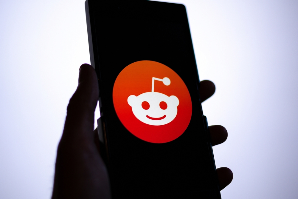 Guildford, UK - June 12, 2023: Reddit app logo on a smartphone screen.