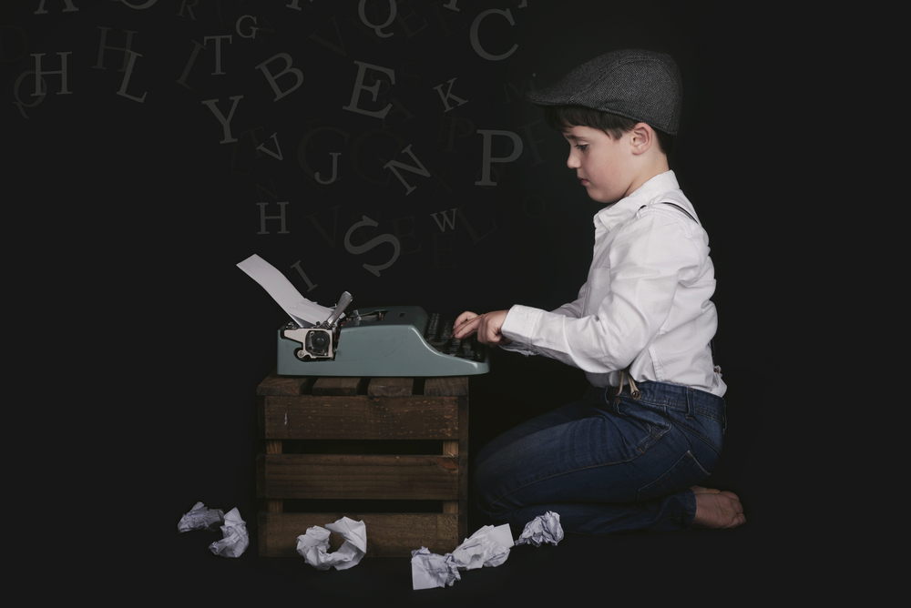 Boy with typewriter