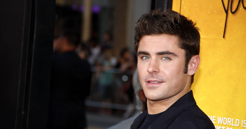 What Happened To Zac Efron’s Face After Social Media Users Say They ‘Can’t Focus’ On His New Movie - Featured image