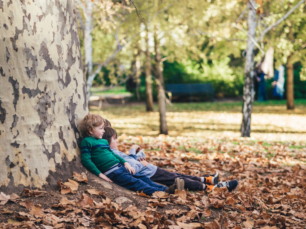 Kids beneath a tree