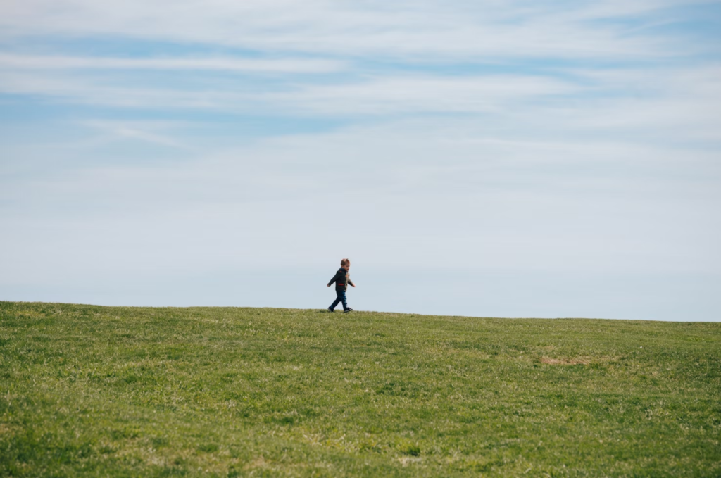 Kid in a field
