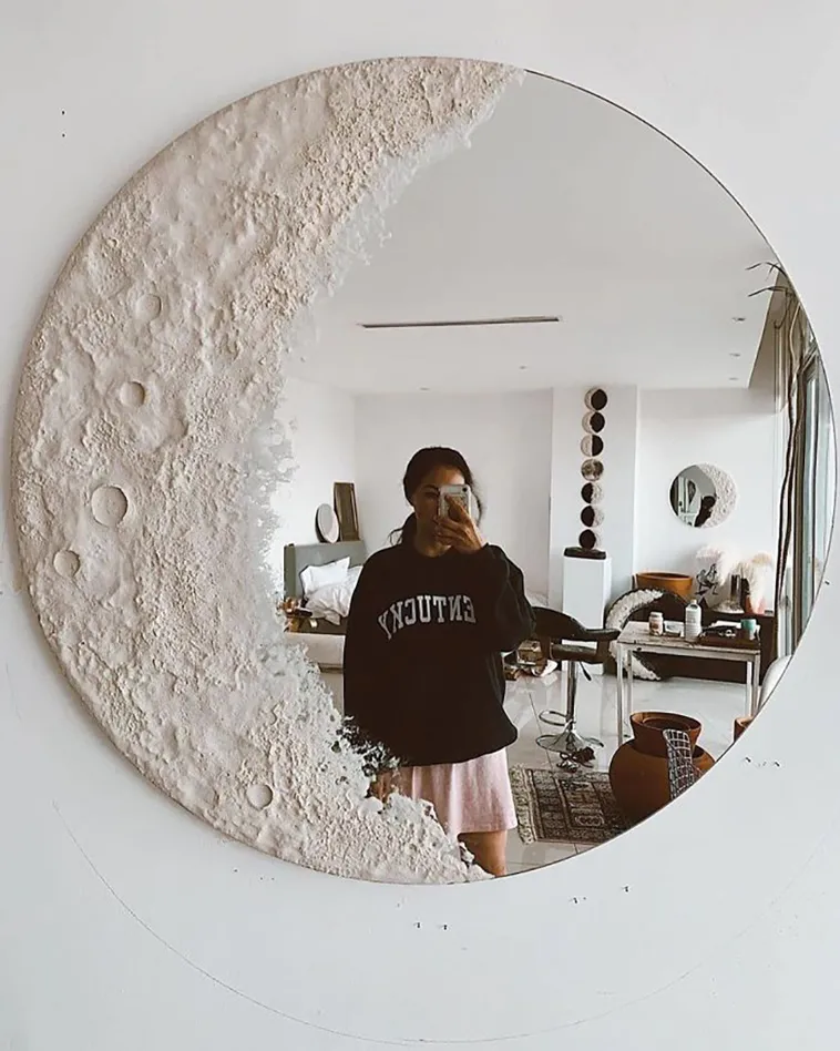A mirror designed like a crescent moon