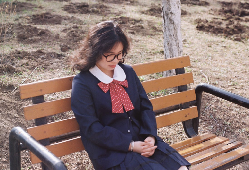 Woman Sitting on Bench