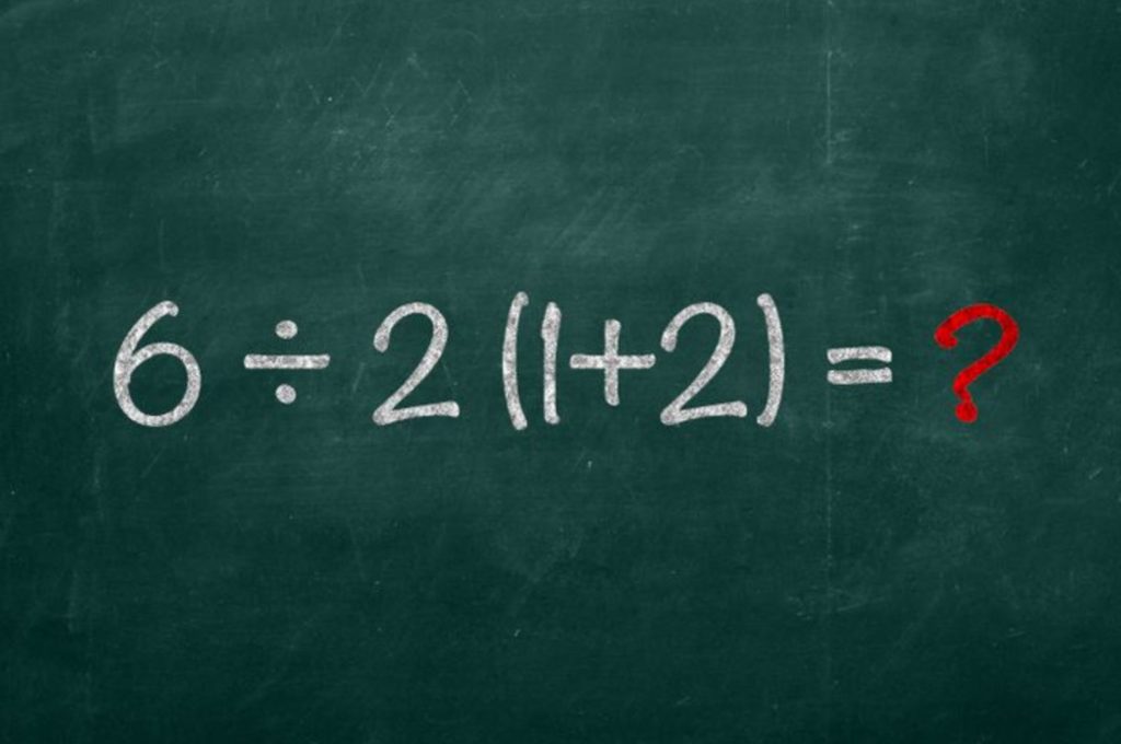 Another problem, written on a chalkboard. White and red text.