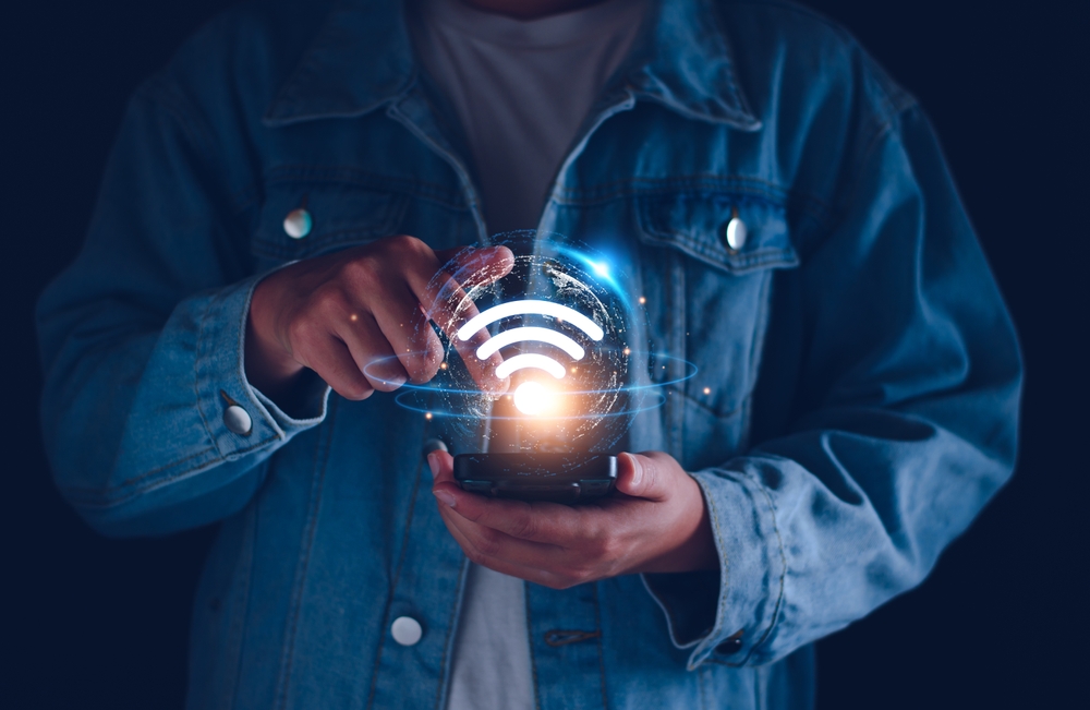 Wifi internet access concept. man using smartphone connect communication, social network, business contact, online shopping via internet wifi hotspot high speed. Fast internet wifi hotspot sharing.