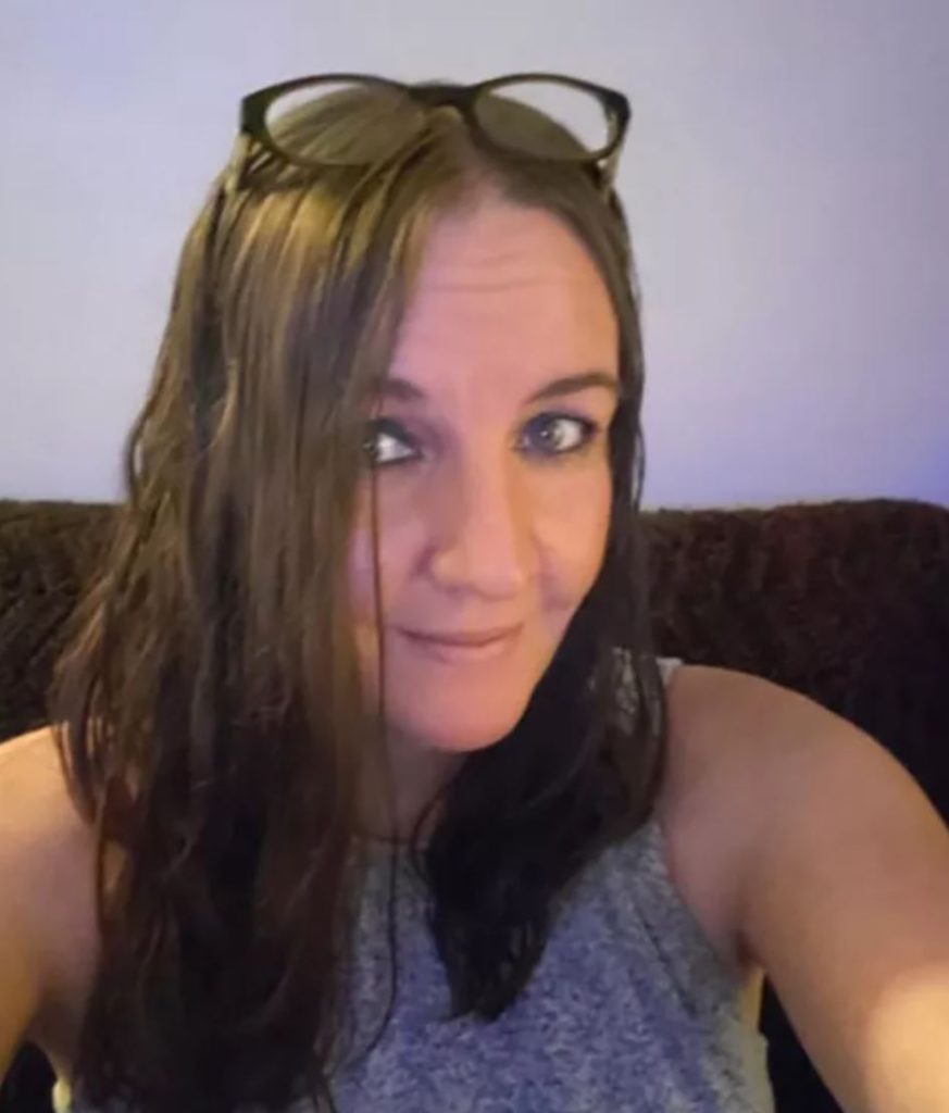 A woman taking a selfie.