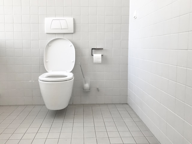toilet in tiled bathroom