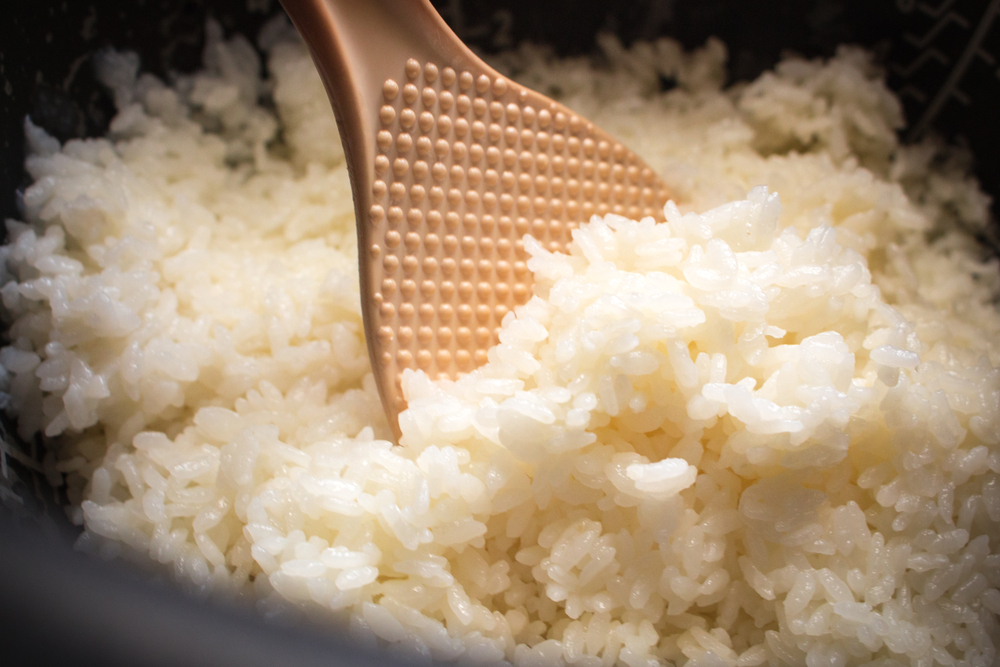 Japanese steamed rice in rice cooker.
