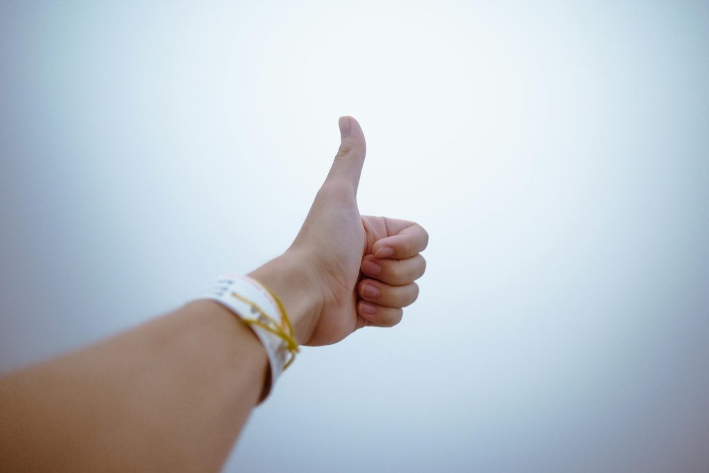 person doing a thumbs up