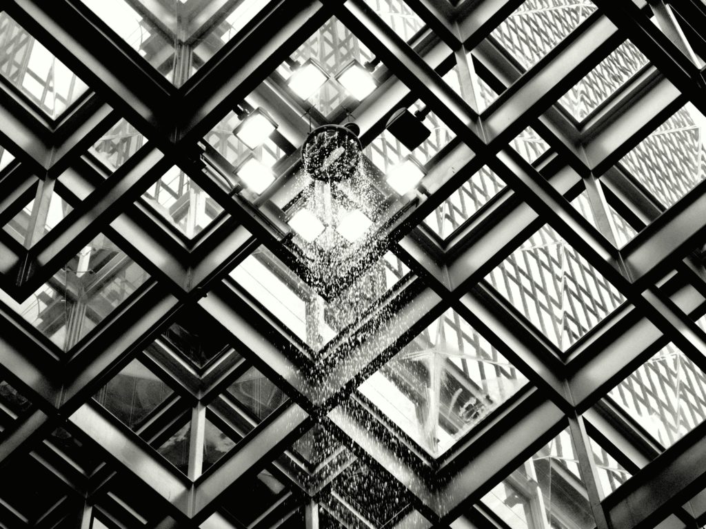 showerhead attached to glass ceiling 