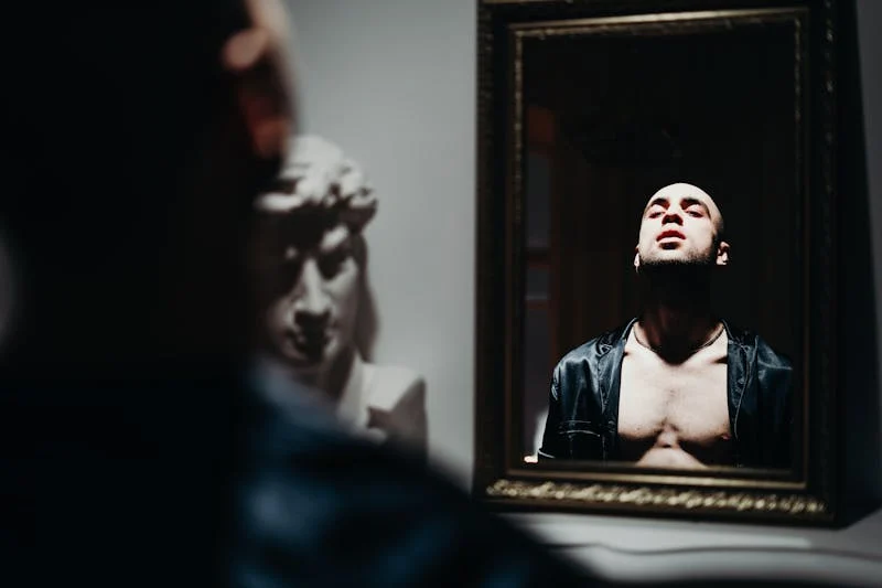 a vain person looking in the mirror