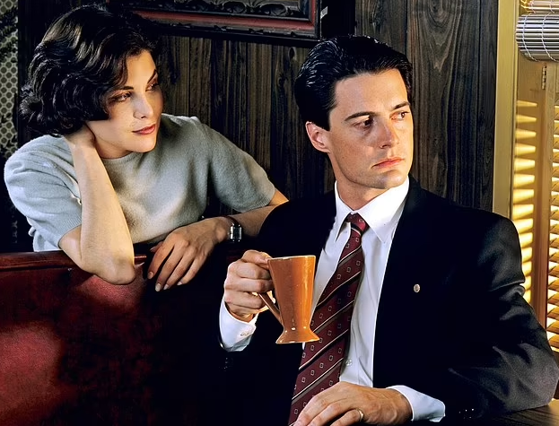 Co-created by Hollywood auteur David Lynch, Twin Peaks starred Kyle MacLachlan (right) as FBI detective Dale Cooper, with whom Audrey is infatuated